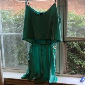 Honey punch romper. Cut outs on the side